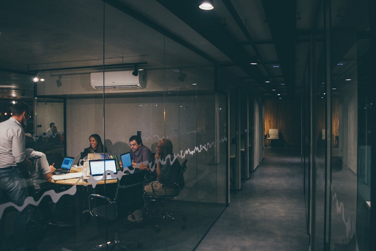A group of people in a meeting