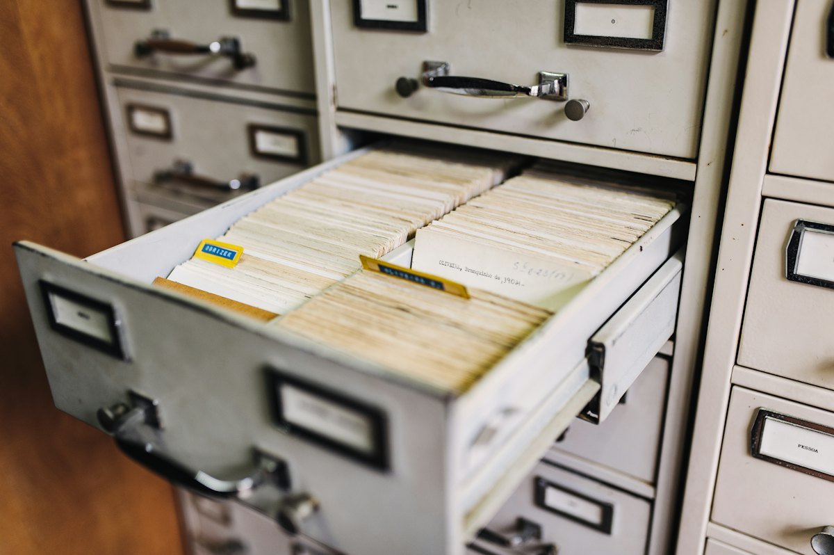 A wall of file cabinet drawers