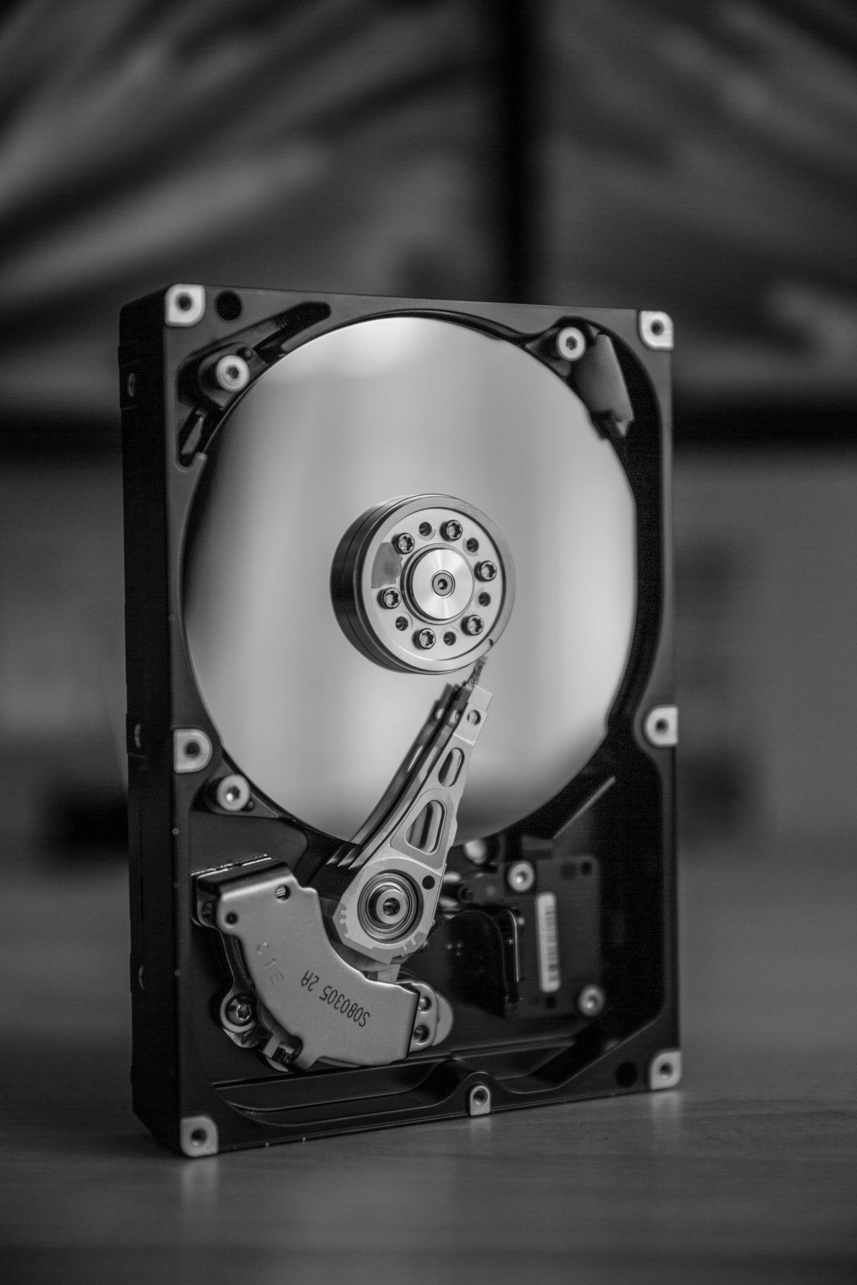 A black and silver hard disk drive